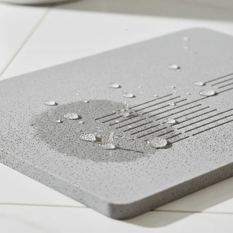 New Magna DryStep Pro bath mat with water droplets showing quick-dry absorbent surface technology
