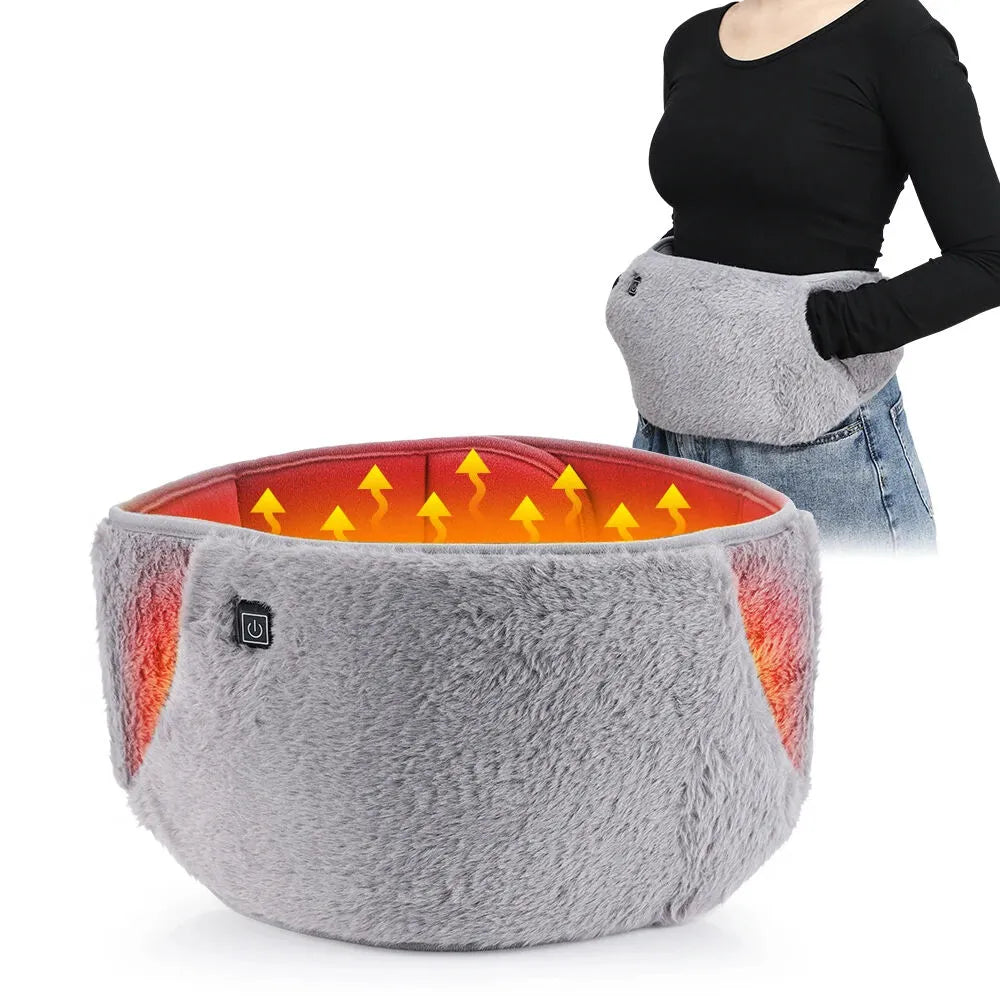 New Magna WarmRelief Pro gray plush electric heating waist belt worn around waist showing red heating zones with yellow heat arrows, power button, and woman with hands in front pocket - USB heated pad for period cramps and back pain